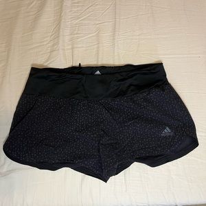 Black (with gray speckles) adidas climate cool athletic shorts.